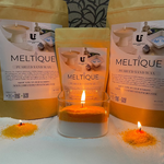 Load image into Gallery viewer, Meltique pearlized sand wax packaging with lit candles